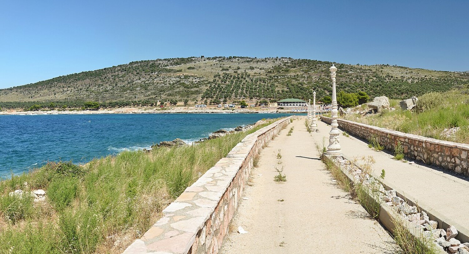 Ksamil promenade — the beach strip and coastal walkway lined with restaurants and beach clubs