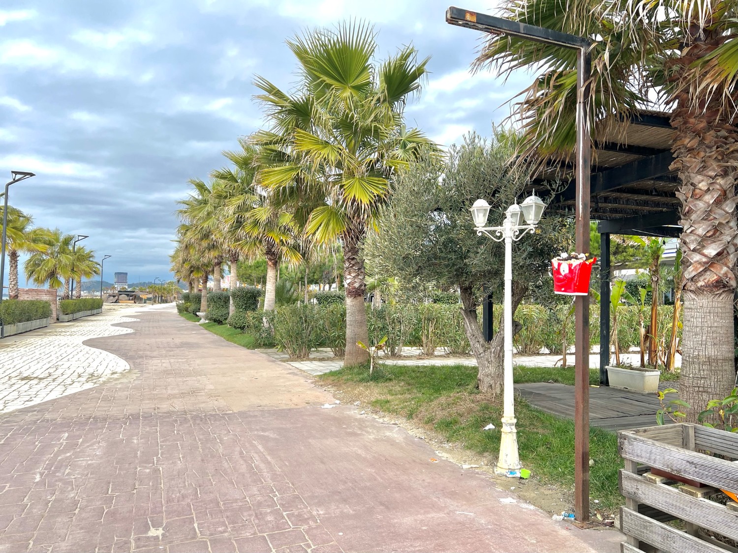 Golem Beach Albania — beachfront promenade and Adriatic coast looking north toward Durrës